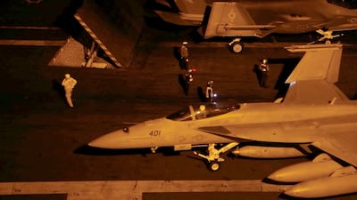 Aircraft on the flight deck of the aircraft carrier USS George Washington, which recently arrived in the Middle East. Reuters