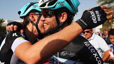 Mark Cavendish of Great Britain and Etixx - Quick-Step celebrates with team mate Carlos Verona Quintanilla of Spain after winning stage one of the Dubai Tour from the Dubai International Marine Club to Union House Flag on February 4, 2015 in Dubai. Bryn Lennon/Getty Images