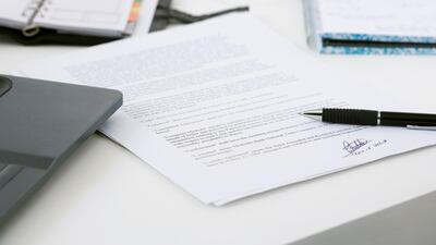 Contracts, once signed, are often filed away in the bottom drawer, only to be referred to when things go wrong. Photo: Getty Images