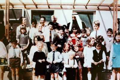 Sheikh Zayed pictured with pupils at the school's original campus near the Corniche in 1968. Courtesy BSAK