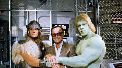 Stan Lee poses with Lou Ferrigno and Eric Kramer who portray 'The Incredible Hulk' and Thor, in Los Angeles, 1988. AP Photo