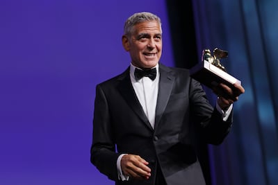 George Clooney receives the lifetime achievement award at the Venice Film Festival. Getty Images