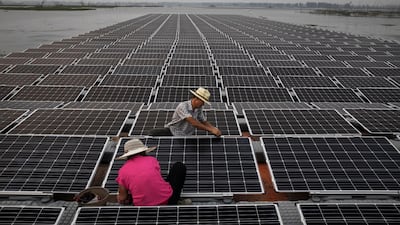Japan's largest floating solar power facility, similar to the floating solar farm project in Anhui provice in China, began operations last month. Kevin Frayer / Getty
