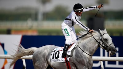 Roberto Perez on Tallaab Al Khalediah elebrates after winning the Dubai Kahayla Classic. Ali Haider / EPA