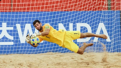 US goalkeeper Christopher Tot makes a save against Switzerland, during the Beach Soccer World Cup Group A game in Paraguay on Thursday. The US won 8-6 EPA