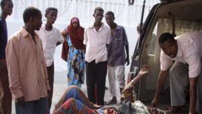 A wounded Somali woman is being carried on a stretcher in Mogadishu's Madina hospital.
