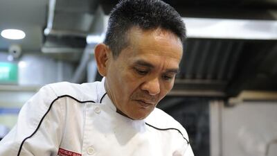 Hawker Chan hard working at his new branch at Smith Street, not far from his original stall in Chinatown Complex.
