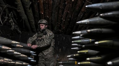 An artilleryman of the Armed Forces of Ukraine prepares shells to fire a M777 Howitzer towards Russian troops. Reuters