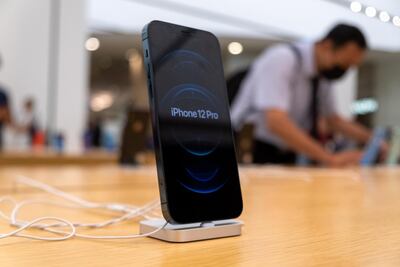 Apple iPhone 12 Pro seen on display at an Apple store in Taipei. Getty Images