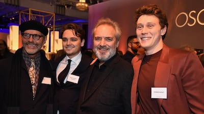 Production designer Dennis Gassner, actor Dean-Charles Chapman, director Sam Mendes and actor George MacKay pose during the luncheon. AFP