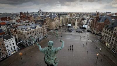 General view of the National Remembrance Day ceremony in an empty Dam Square in Amsterdam, the Netherlands, where King Willem-Alexander and Queen Maxima laid a wreath. EPA