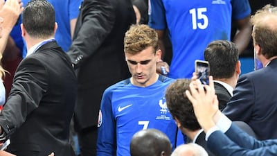 France's Antoine Griezmann looks at the ground after his team's 1-0 loss in the Euro 2016 final on Sunday night. Franck Fife / AFP / July 10, 2016