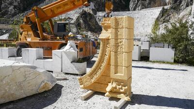 Workers construct the 3D marble replica Palmyra’s Arch of Triumph at the marble caves of Carrara, Italy. Marco Secchi / Getty Images