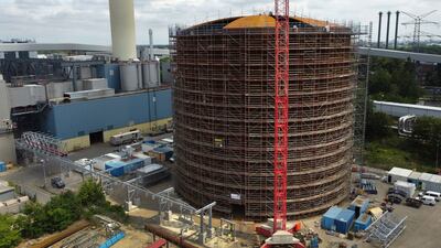 The pant turns solar and wind energy into heat, which can be stored in a vast thermal tank and released into the German capital's grid as needed. AP