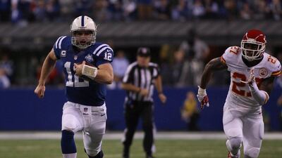 Andrew Luck and the Colts will face either the Broncos or Patriots in the AFC semi-finals. Steven C Mitchell / EPA