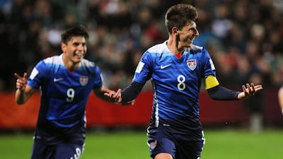 US captain and Fulham player Emerson Hyndman celebrates scoring his team’s second goal in a 4-0 Fifa Under 20 World Cup victory against New Zealand on Tuesday. Ben Campbell / EPA / June 2, 2015