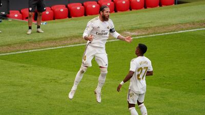 Real Madrid's Sergio Ramos celebrates scoring their first goal from the penalty spot. Reuters