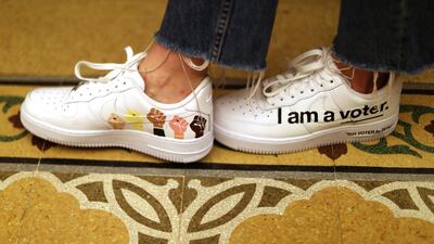 A woman lines up to vote at a polling station on Super Tuesday in Beverly Hills, California, U.S. REUTERS