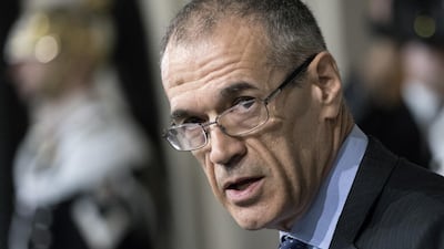 Carlo Cottarelli, Italy's premier-designate attends a news conference at the Quirinale Palace in Rome, Italy, on Monday, May 28, 2018. President Sergio Mattarella asked Cottarelli, a former executive director of the International Monetary Fund -- where he has worked for more than 25 years -- to form a government on Monday, a day after the head of state vetoed a euroskeptic, Germany-bashing economist as finance minister proposed by the Five Star Movement and League parties. Alessia Pierdomenico/Bloomberg