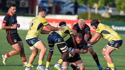 Action from the the UAE Premiership final between Dubai Exiles (black) v Dubai Hurricanes (yellow) held at The Sevens in Dubai