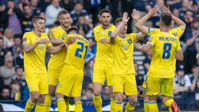 Ukraine'ss Andriy Yarmolenko (second left) celebrates after scoring his side's first goal. PA
