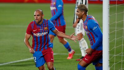 Barcelona's Martin Braithwaite celebrates scoring their second goal with Ronald Araujo.