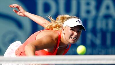 Caroline Wozniacki in action against Jelena Jankovic.