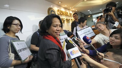 Members of Hong Kong Journalists Association submit petitions to Bernardita Catalla (Centre), Consul General of Philippine in 2014. South China Morning Post via Getty Images