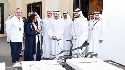 Sheikh Hamdan tours the exhibit.