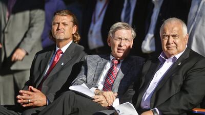 Bud Selig, centre, sits with San Diego Padres chief executive Ron Fowler, right. Lenny Ignelzi / AP Photo