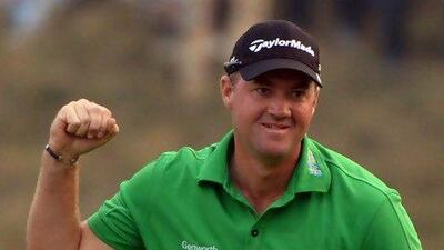 Rory McIlroy, in blue, who lost to Peter Hanson in the BMW Masters, will be absent from the WGC-HSBC Champions this week. Mark Ralston / AFP