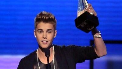 Justin Bieber accepts the award for Favorite Pop/Rock Male Artist at the 40th Annual American Music Awards on Sunday. John Shearer / AP Photo