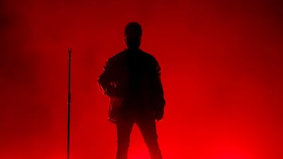 The Weeknd is silhouetted during the Yasalam After-Race concert at the Yas Island. AP