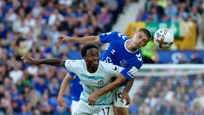 Chelsea's Raheem Sterling battles for the ball with Everton's Vitalii Mykolenko in the Blues' 1-0 win in their opening fixture. AP