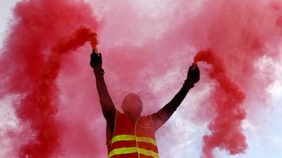 A protester, wearing a CGT labour union vest, during a demonstration in Nice. Reuters