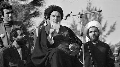 Ayatollah Khomeini speaks to followers at Behesht Zahra Cemetery after his arrival in Tehran, Iran, ending 14 years of exile, on February 1, 1979. AP Photo