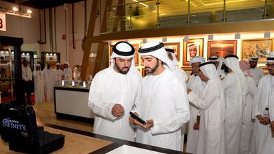 Sheikh Hamdan bin Mohammed, Crown Prince of Dubai, visits hunting weapons stalls at Adihex on Friday. Wam