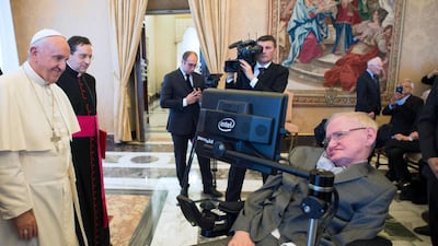 Pope Francis, left, meets with English theoretical physicist and cosmologist Stephen Hawking at the Vatican on November 28, 2016. Filippo Monteforte / AFP