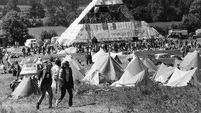 People at the second Glastonbury Festival in 1971, which was the first time a pyramid stage was used. Getty Images
