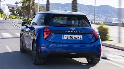 New triangular rear lights are connected by a horizontal black bar stretching across the tailgate