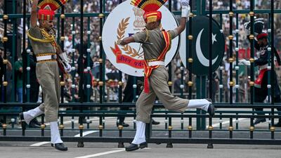 Indian Border Security Force personnel perform during the beating retreat ceremony at the Attari-Wagah border between Pakistan and India, on the eve of India's Independence Day on July 15. AFP