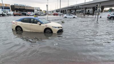 A taxi stalls in the water in Al Quoz. Antonie Robertson / The National