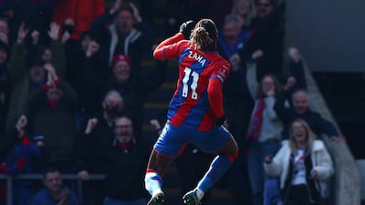 Wilfried Zaha celebrates after scoring the third goal. AFP