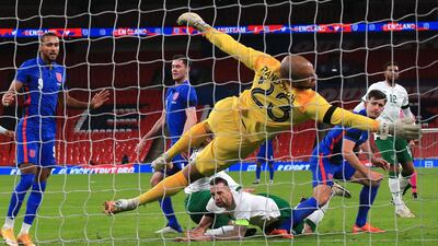 Harry Maguire, right, sees his header hit the back of the net during his team's international friendly victory over the Republic of Ireland at Wembley Stadium on Thursday, November 12. Getty