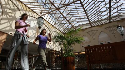 Mall walkers at Mall of the Emirates in Dubai. Pawan Singh / The National