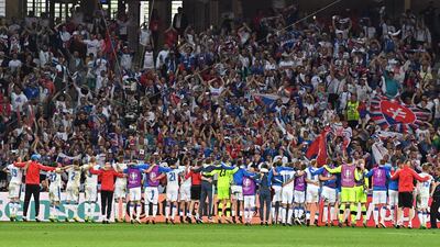 Slovakia players celebrate with their supporters at the end of the Euro 2016 Group B soccer match between Russia and Slovakia at the Pierre Mauroy stadium in Villeneuve d’Ascq, near Lille, France, Wednesday, June 15, 2016. Slovakia defeated Russia 2-1. (AP Photo/Geert Vanden Wijngaert)