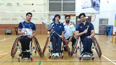 The athletes and coach Aditya Singh are ready for the nation's first shot at the world para badminton championship. Victor Besa / The National