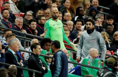 Chelsea manager Maurizio Sarri heads towards the tunnel at Wembley after Kepa Arrizabalaga refuses to be substituted. Reuters