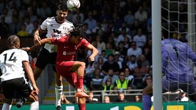 Fulham striker Aleksandar Mitrovic heads home the opening goal. AFP