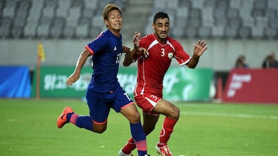 Palestine players, in red, will travel to Saudi Arabia to play in a World Cup qualifier. Stanley Chou / Getty Images
